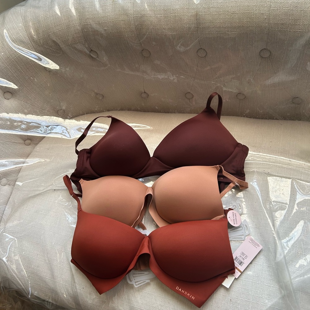 THREE brand new Danskin wireless bras 38c